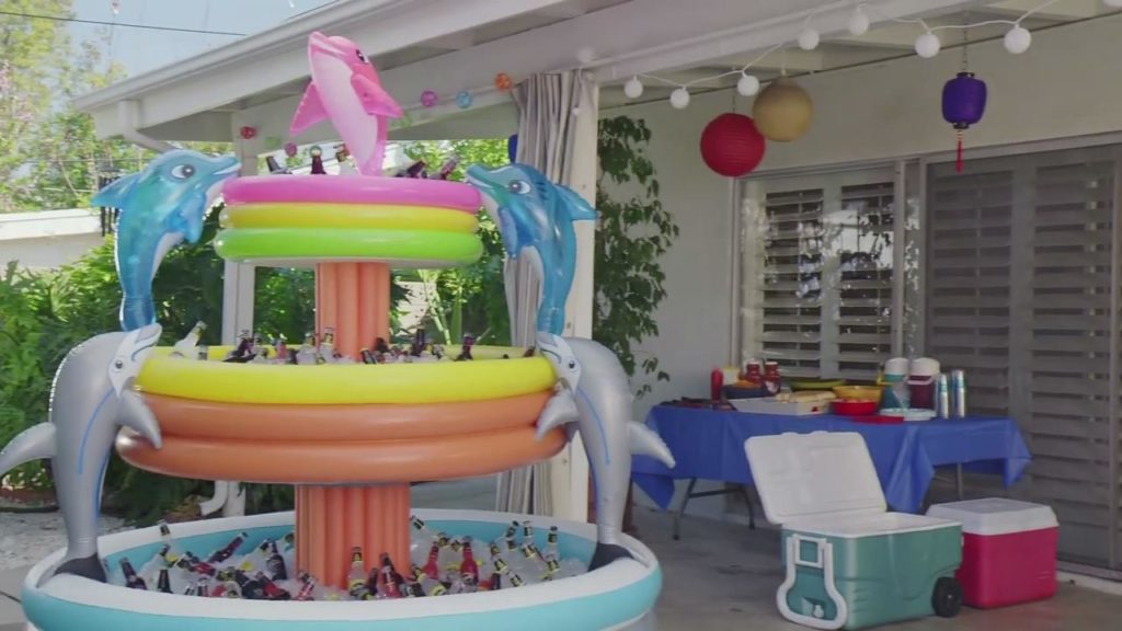 Mikes Hard Lemonade Ad that has a pool cooler at a childs birthday party