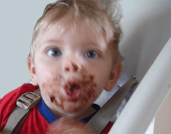 baby with cake in face